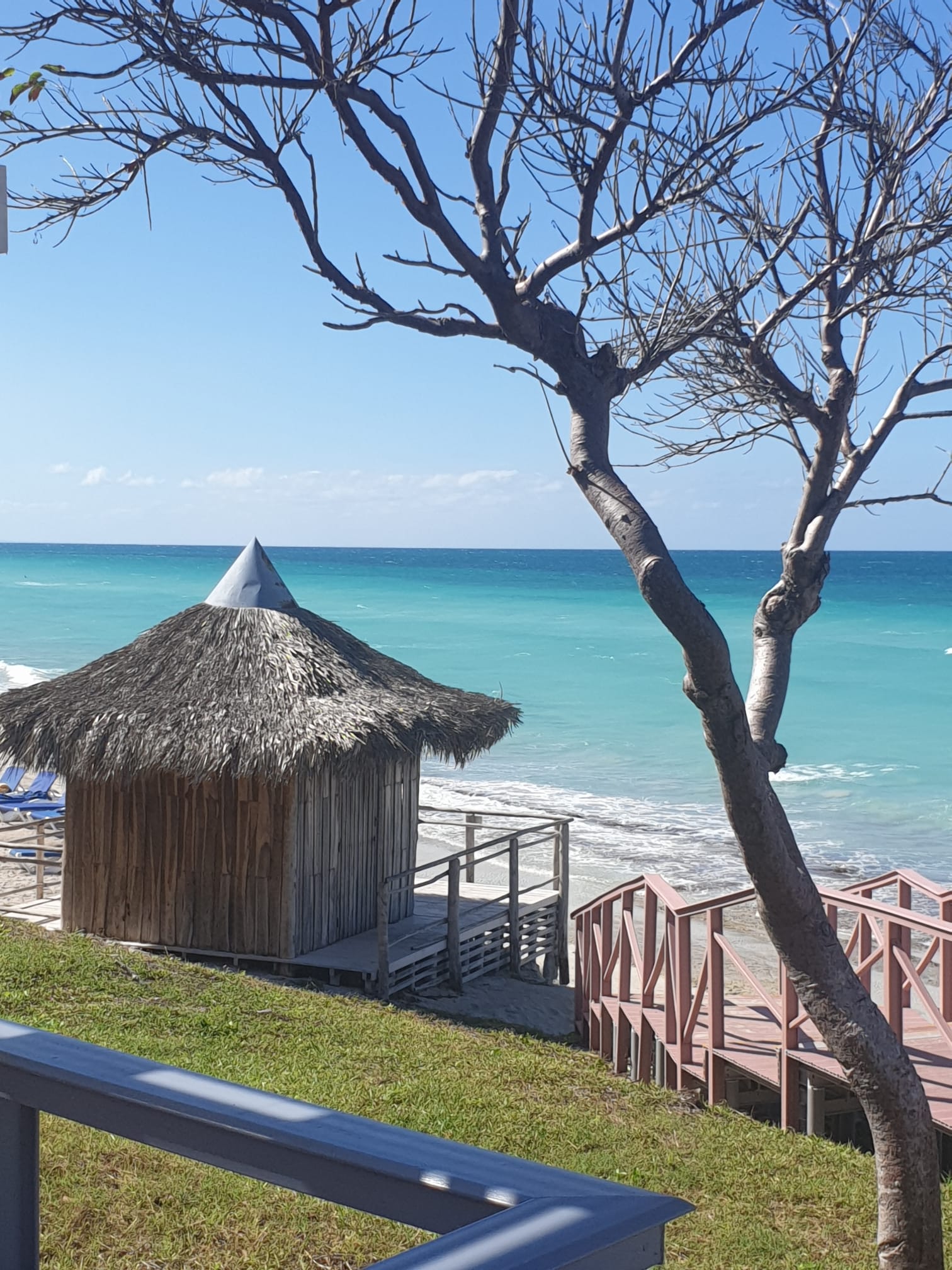 View point from the right on beach walkway 5-star Melia Varadero hotel