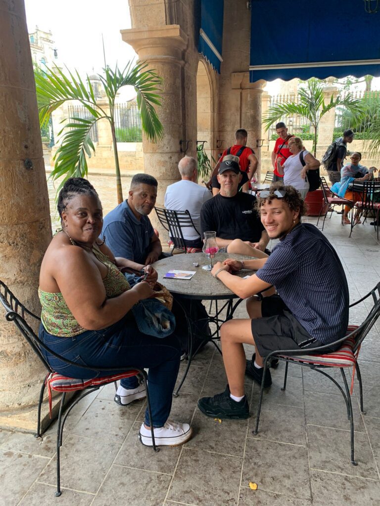 Travellers take a picture at Lunch in Havana