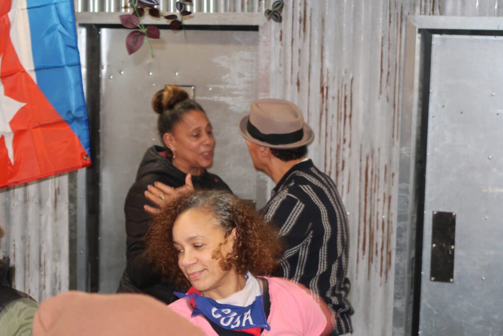 Denise & Alan dancing with Jenni in the frame at A Taste of Salsa Caribbean Roast event