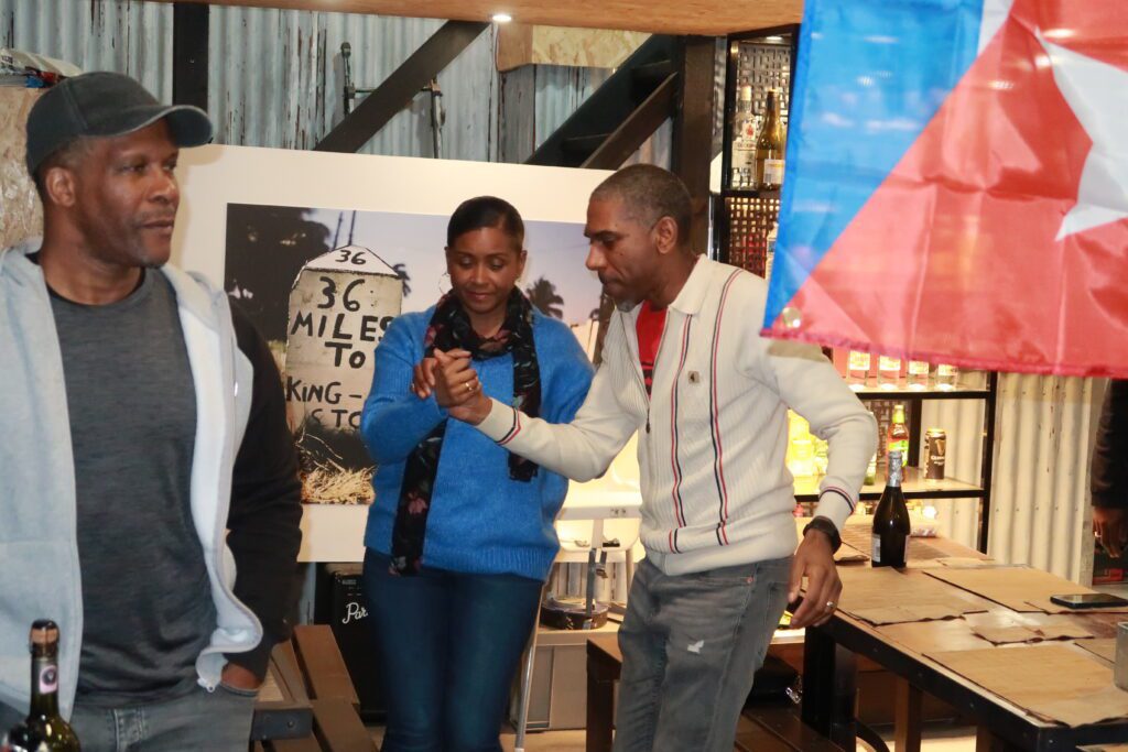 Leana and Pat dancing with Steevo making an appearance at A Taste of Salsa Caribbean Roast event