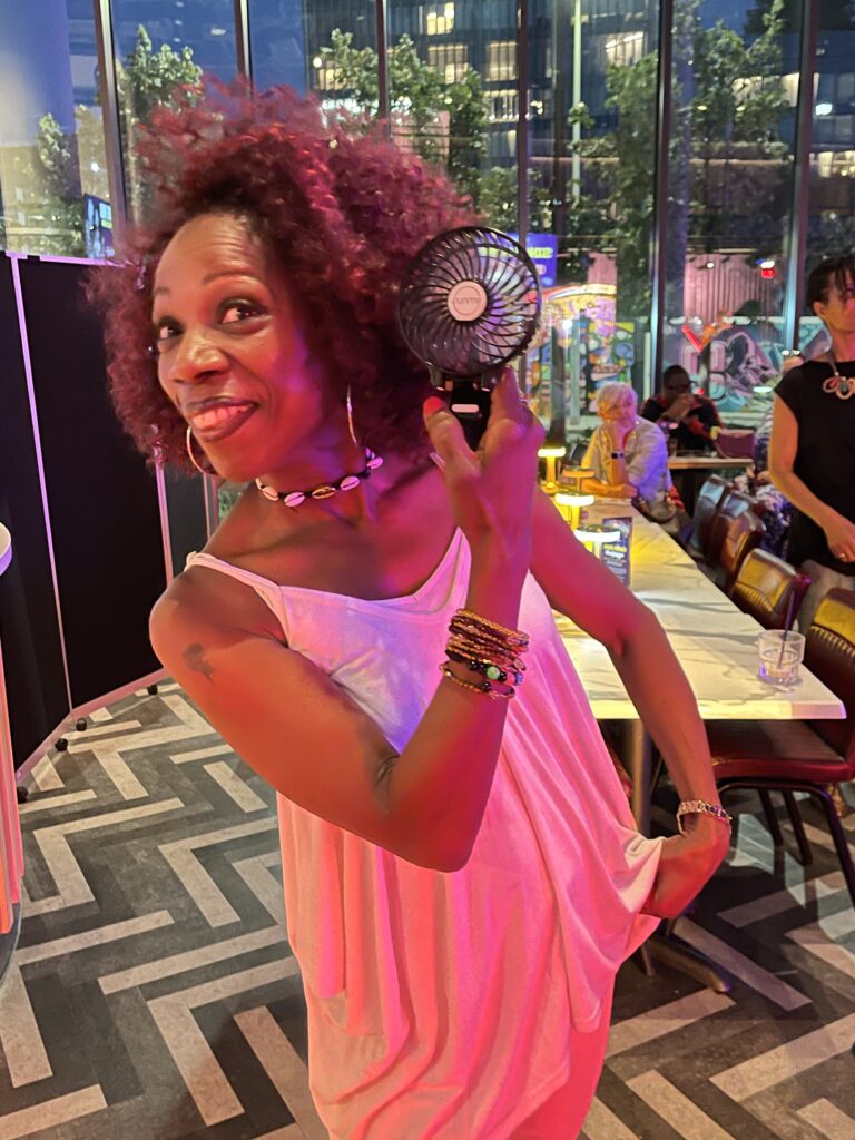 Joan poses whilst listening to Son Yambu at Soul Mama
