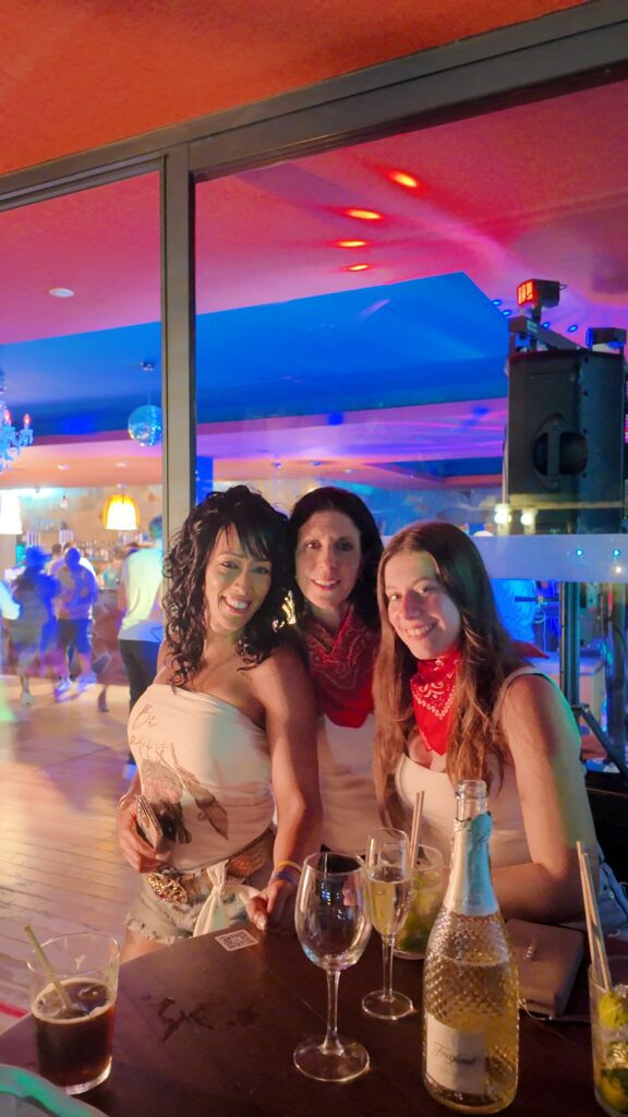 Guests pose at Wild West West night