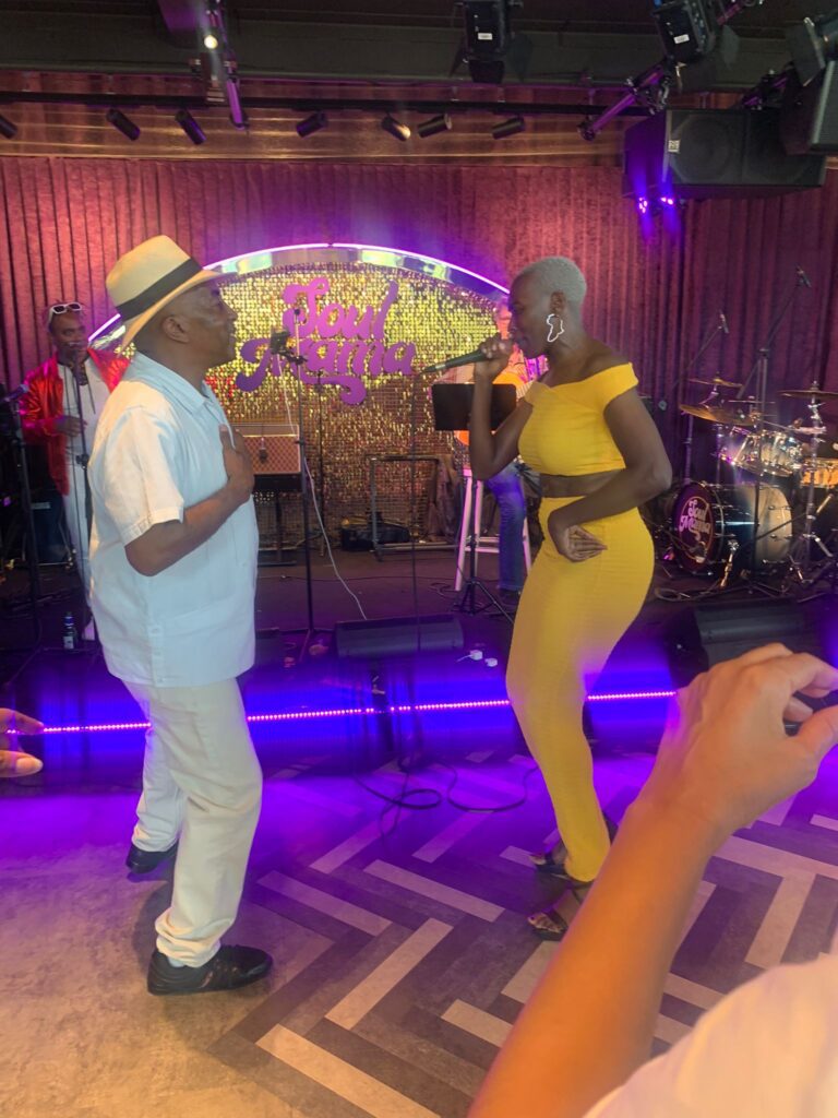 Roy joins Nana on the dance floor