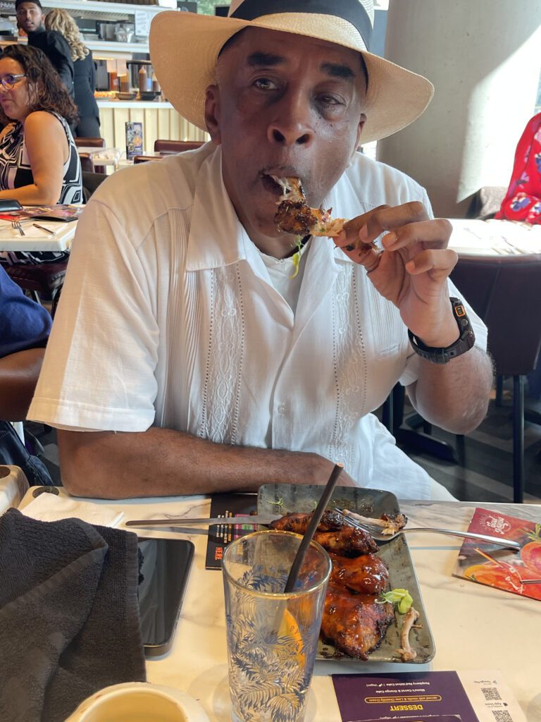 Roy eating delicious Wings.. yum yum!