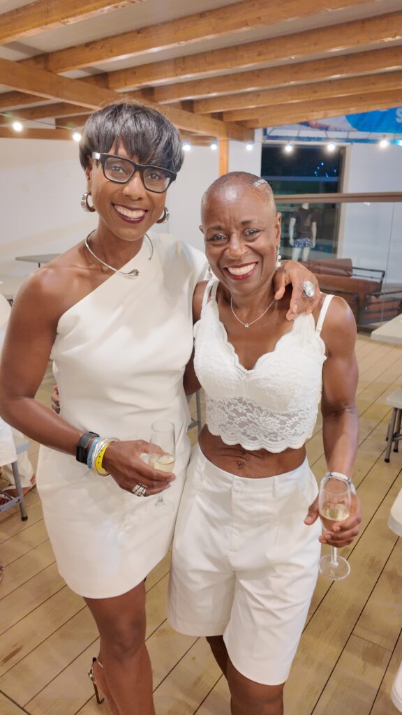 Guests pose at White Party