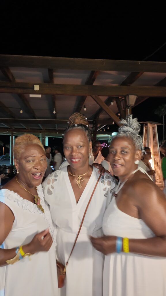 Travellers & Guest pose at White Party
