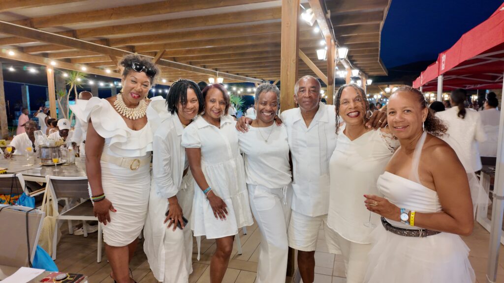 'A Taste of Salsa' team pose at White Party
