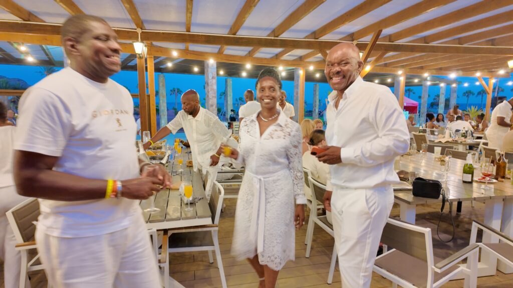 Guests pose at White Party during SALSOGA '25