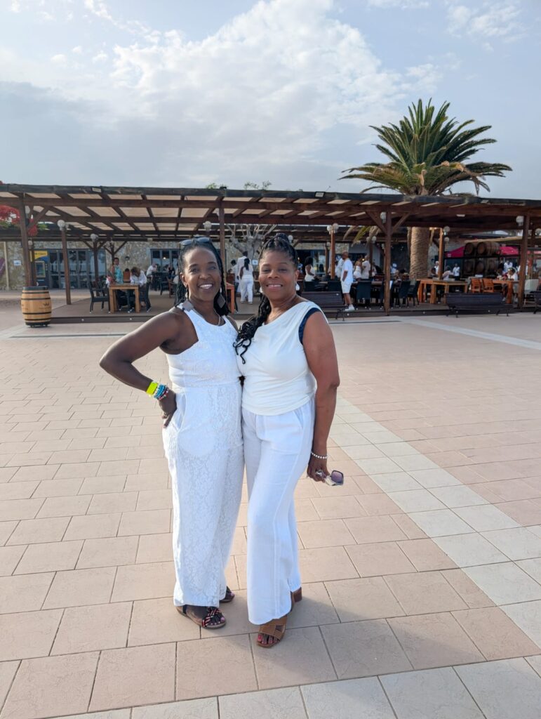 'A Taste of Salsa' Travellers Izzy & June pose at SALSOGA '25 White Party
