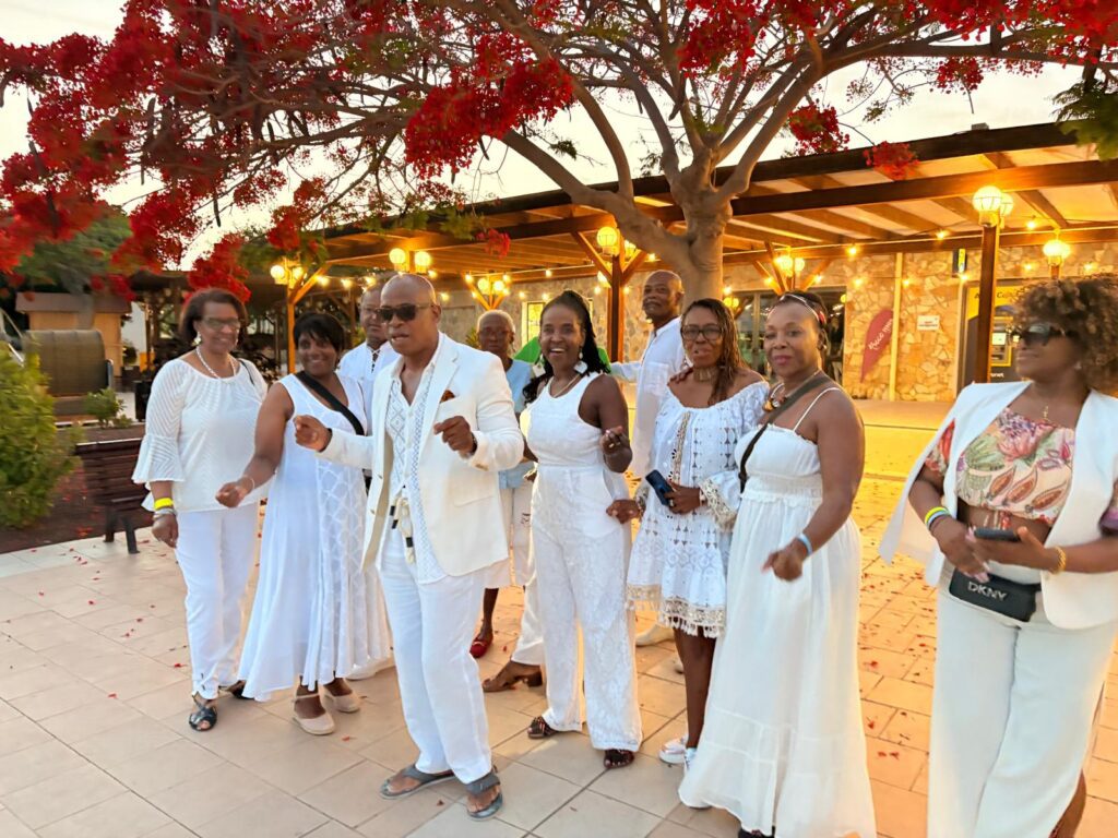 'A Taste of Salsa' Travellers pose at SALSOGA '25 White Party