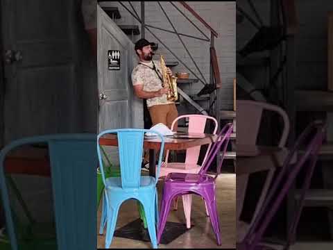 Saxophonist playing at Cafe Kilometer Havana. Great food and music what more can you ask for!
