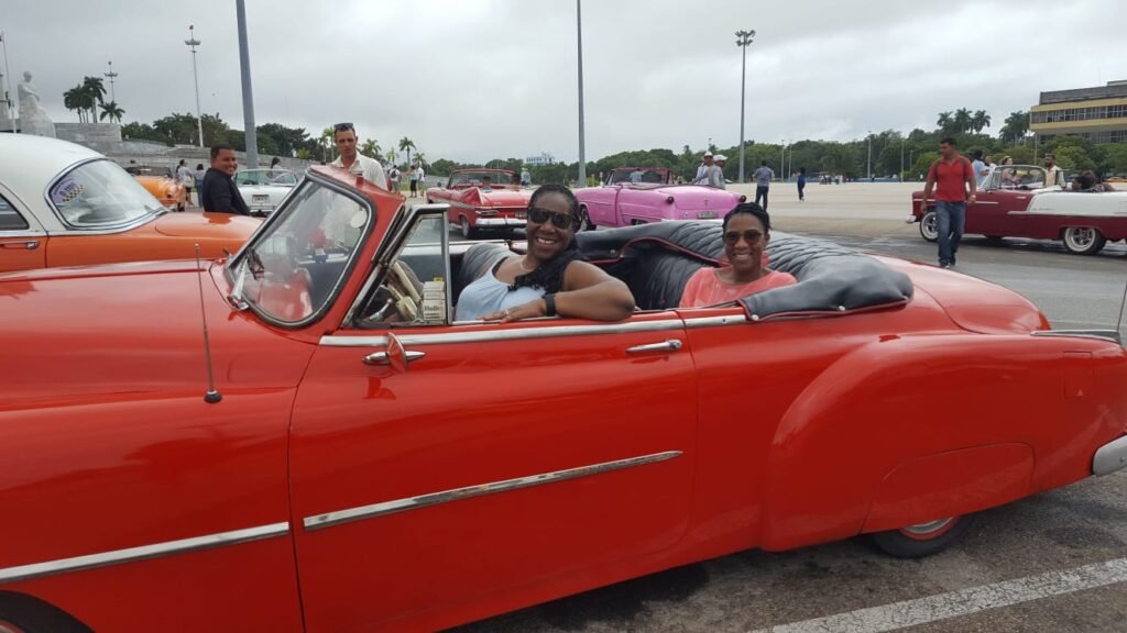 Coral & Marica pose during Havana classic car tour