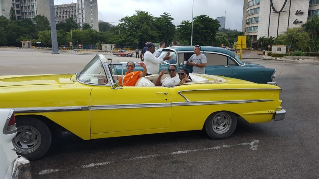 Aisha, Dee & Janet pose during Havana classic car tour