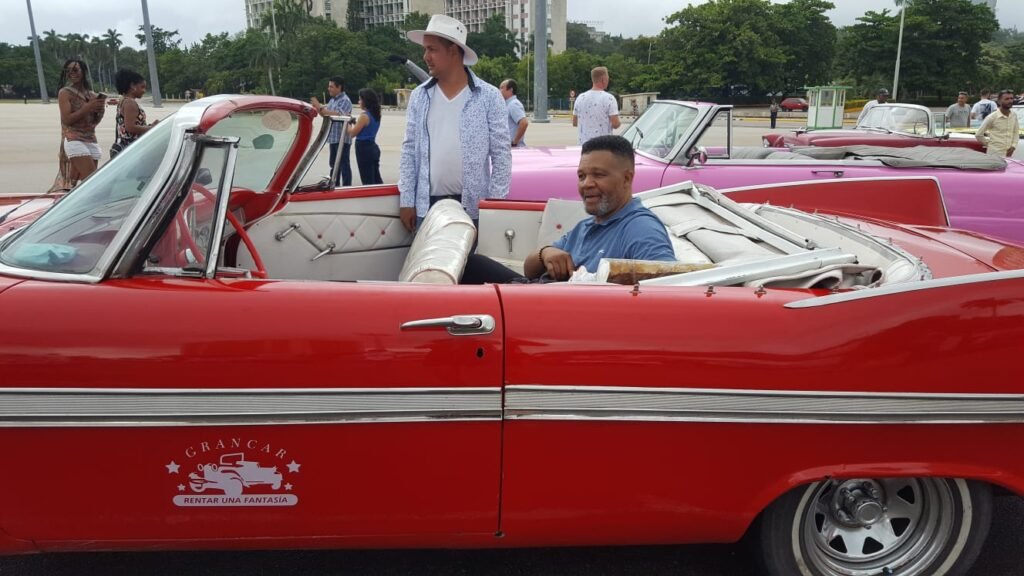 Rudy poses during Havana classic car tour