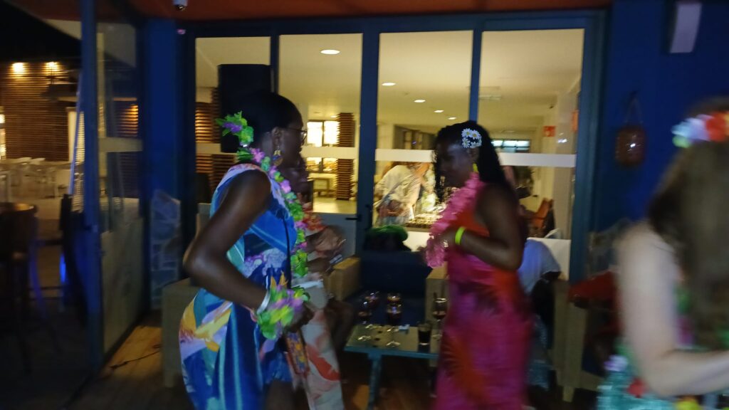 Travellers on the dance floor at SALSOGA '24 Hawaii night