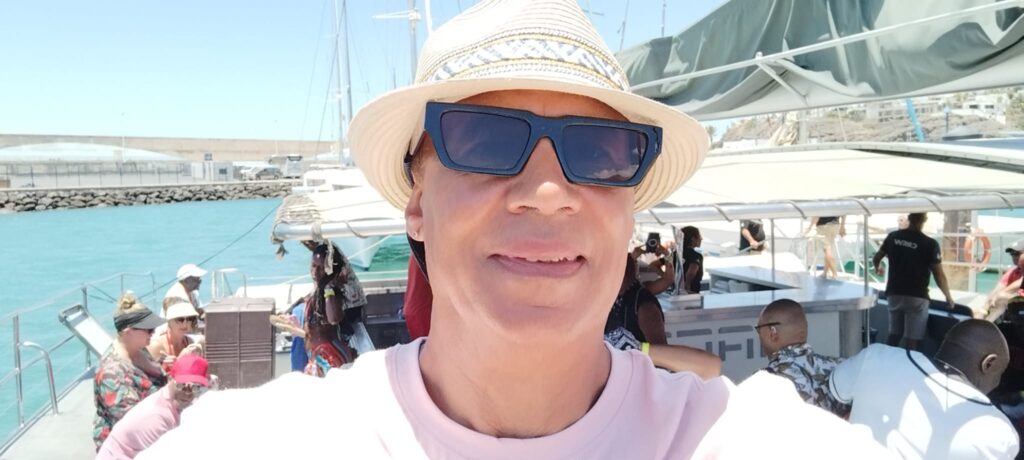 Alan posing onboard SALSOGA '24 Boat Party
