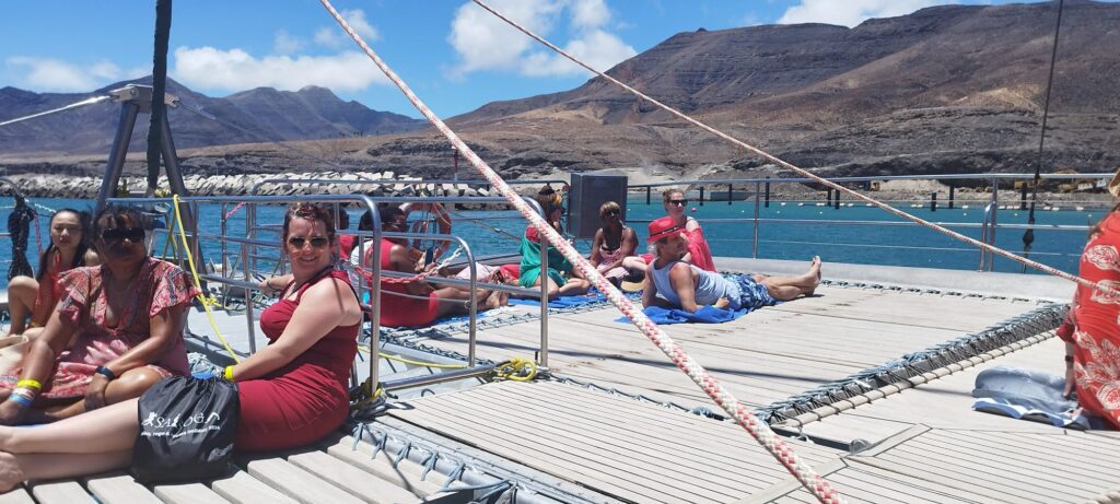 Travellers relaxing onboard during SALSOGA '24 Boat Party