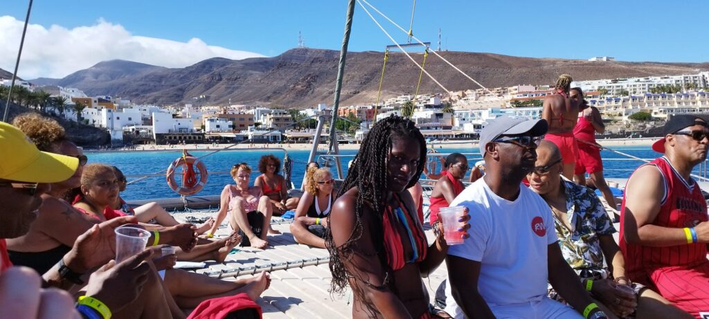 Travellers relaxing onboard during SALSOGA '24 Boat Party