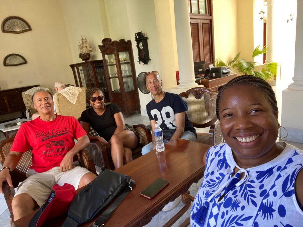 Travellers pose at Casa mi Terra in Havana Old Town