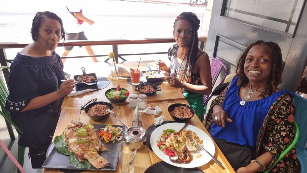 Carol, Joan and Monica pose whilst at lunch