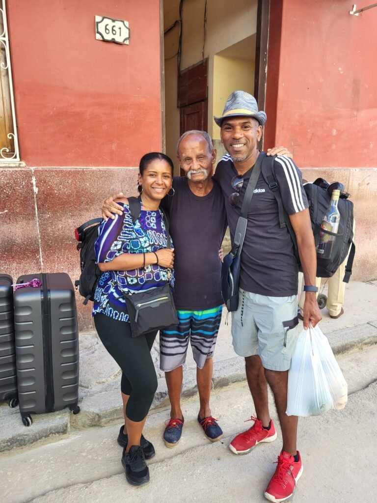 Leanne & Pat take a picture with local Cuban man in Havana