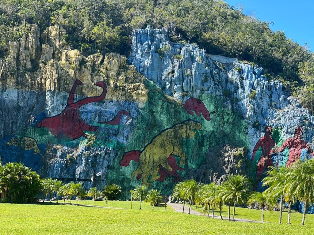 Travellers visit Vinales mural