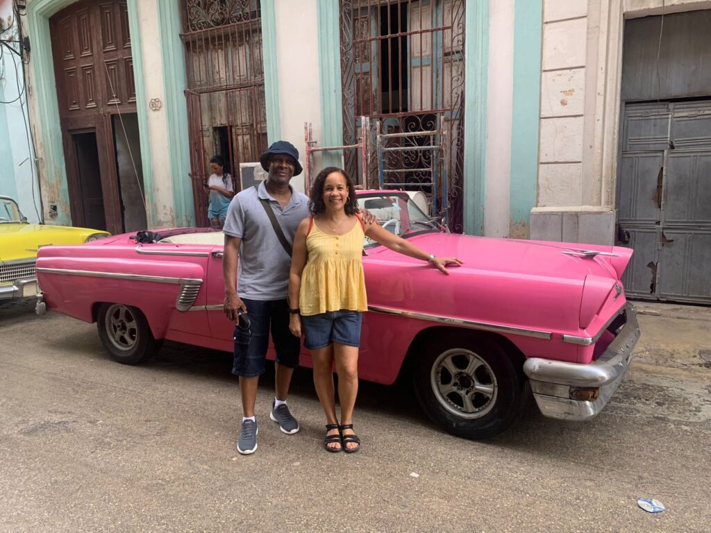 Jenni & Steevo pose as they get ready for Havana classic car tour