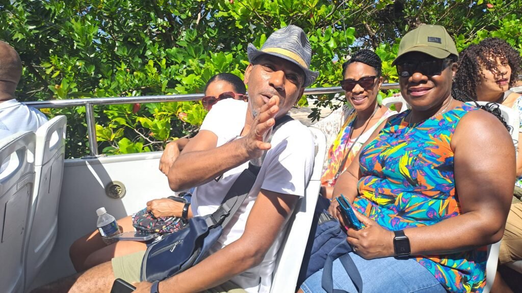 Travellers pose on the Havana bus tour