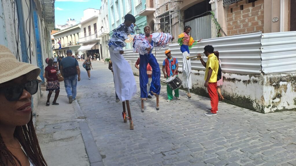 Parade in Havana - Stilt people