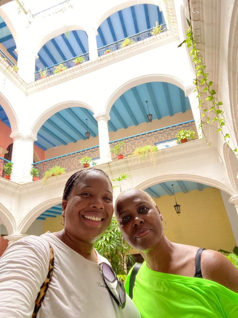 Aisha & Janet pose whilst on the Havana classic car tour