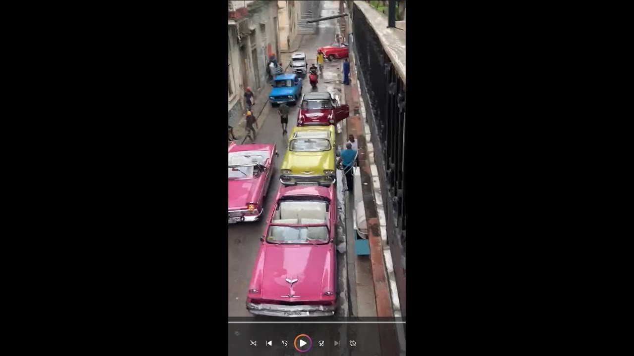 A convoy of classic convertible cars arrive at our, casa Santander Orimi, to take the "A Taste of Cuba"  travelers on a grand tour of Havana city