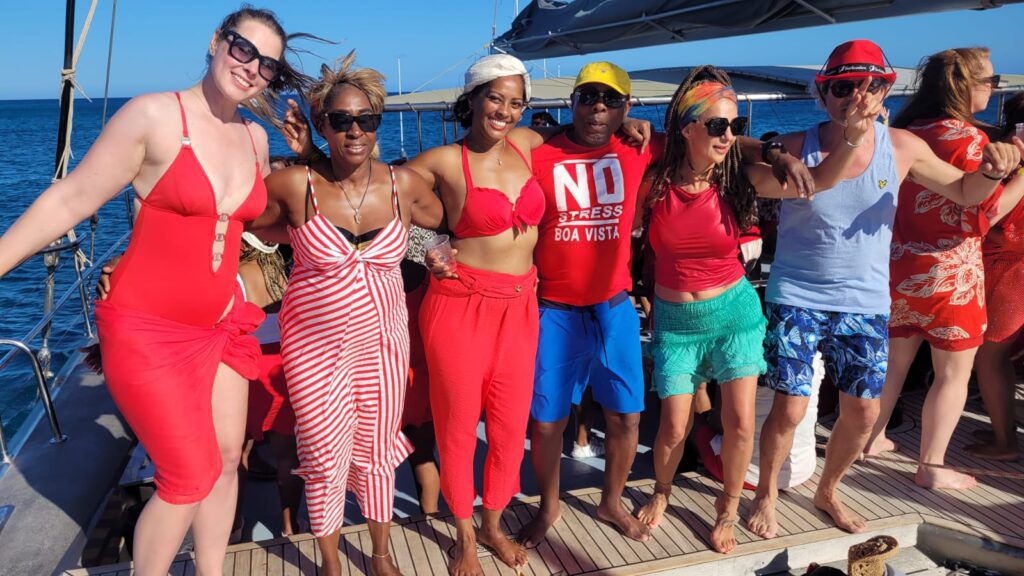 Yoga team posing on boat during SALSOA '24 Boat Party